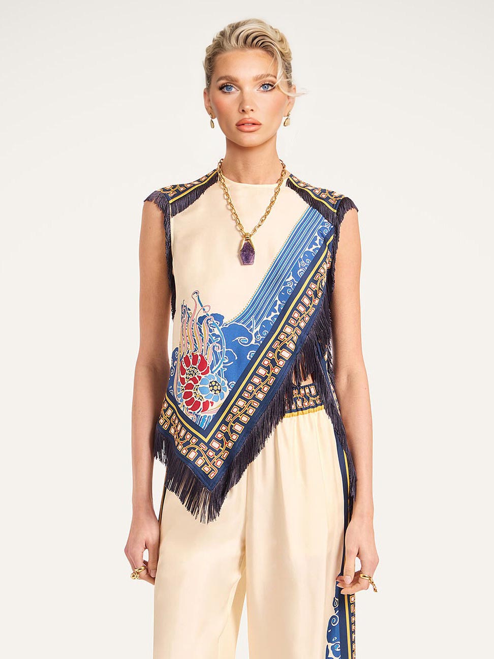 Conjunto bohemio elegante de dos piezas con chaleco estampado y borlas