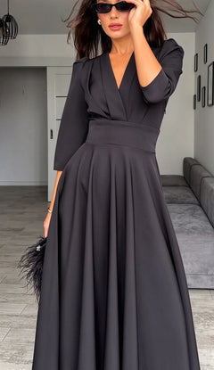 Black V-Neck Midi Dress with Puff Sleeves and Pleated Waistline [erp-image:a512483ced80b0f55babd2a3]