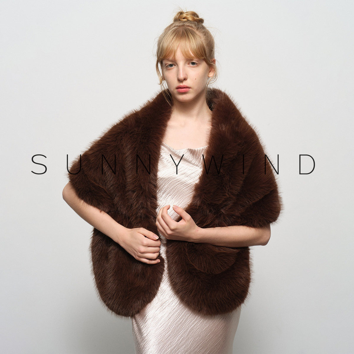 Stylish and elegant faux fur-collared shawl for evening party gowns.