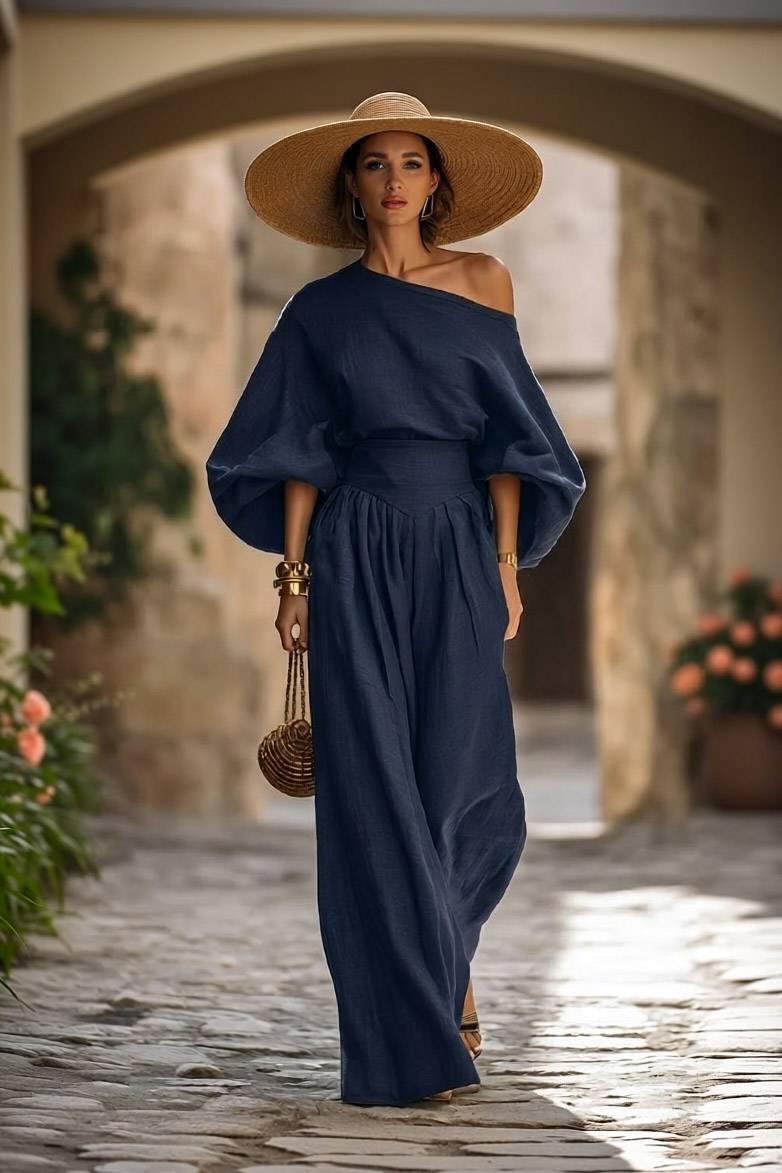 Completo con camicia a spalle scoperte e pantaloni a gamba larga