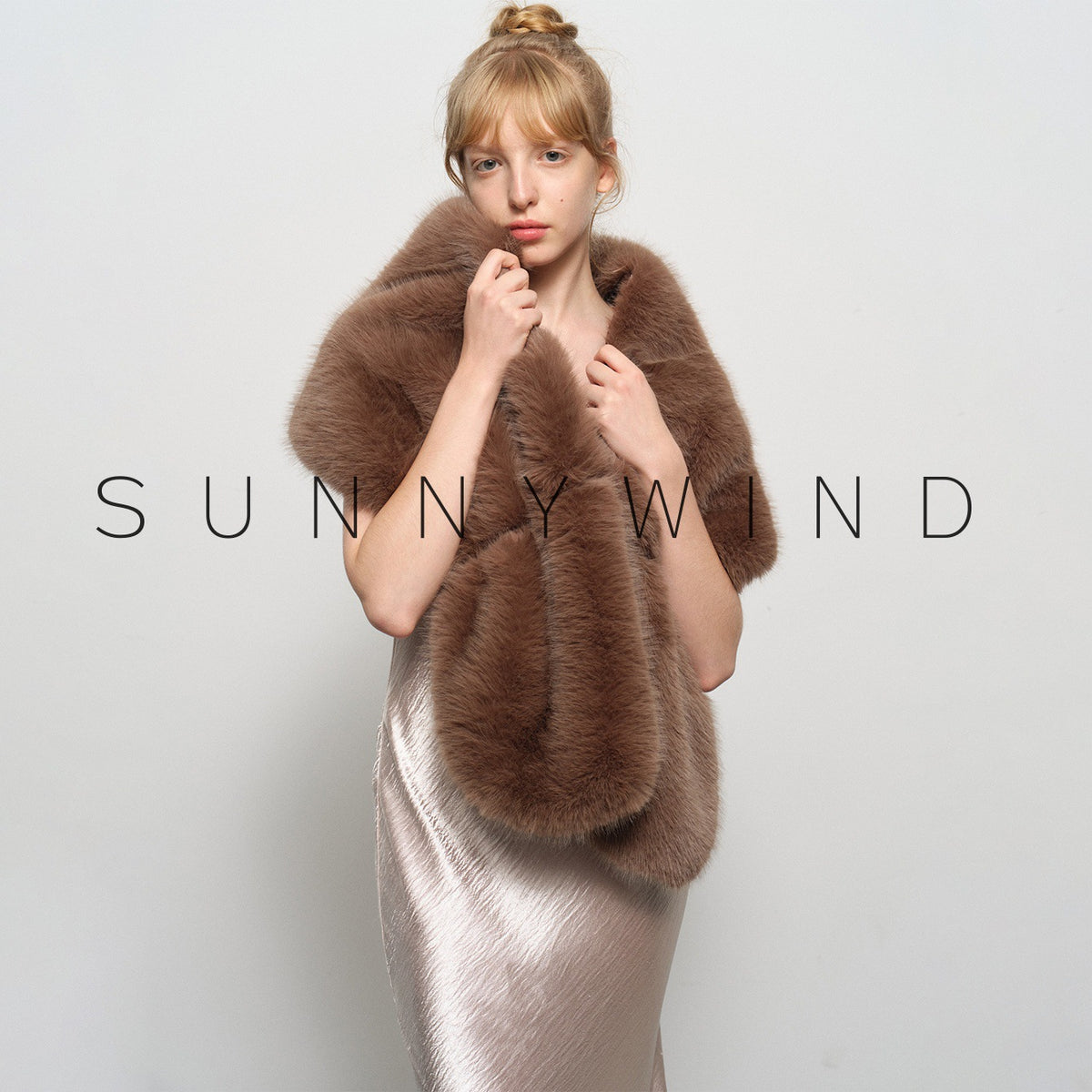 Stylish and elegant faux fur-collared shawl for evening party gowns.