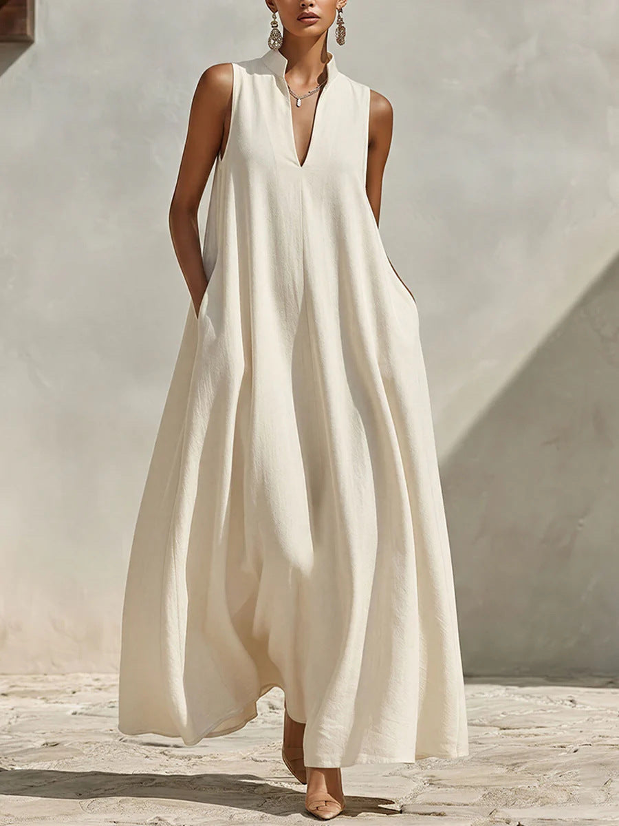 Vestido largo holgado de lino sin mangas, con cuello mao y abertura