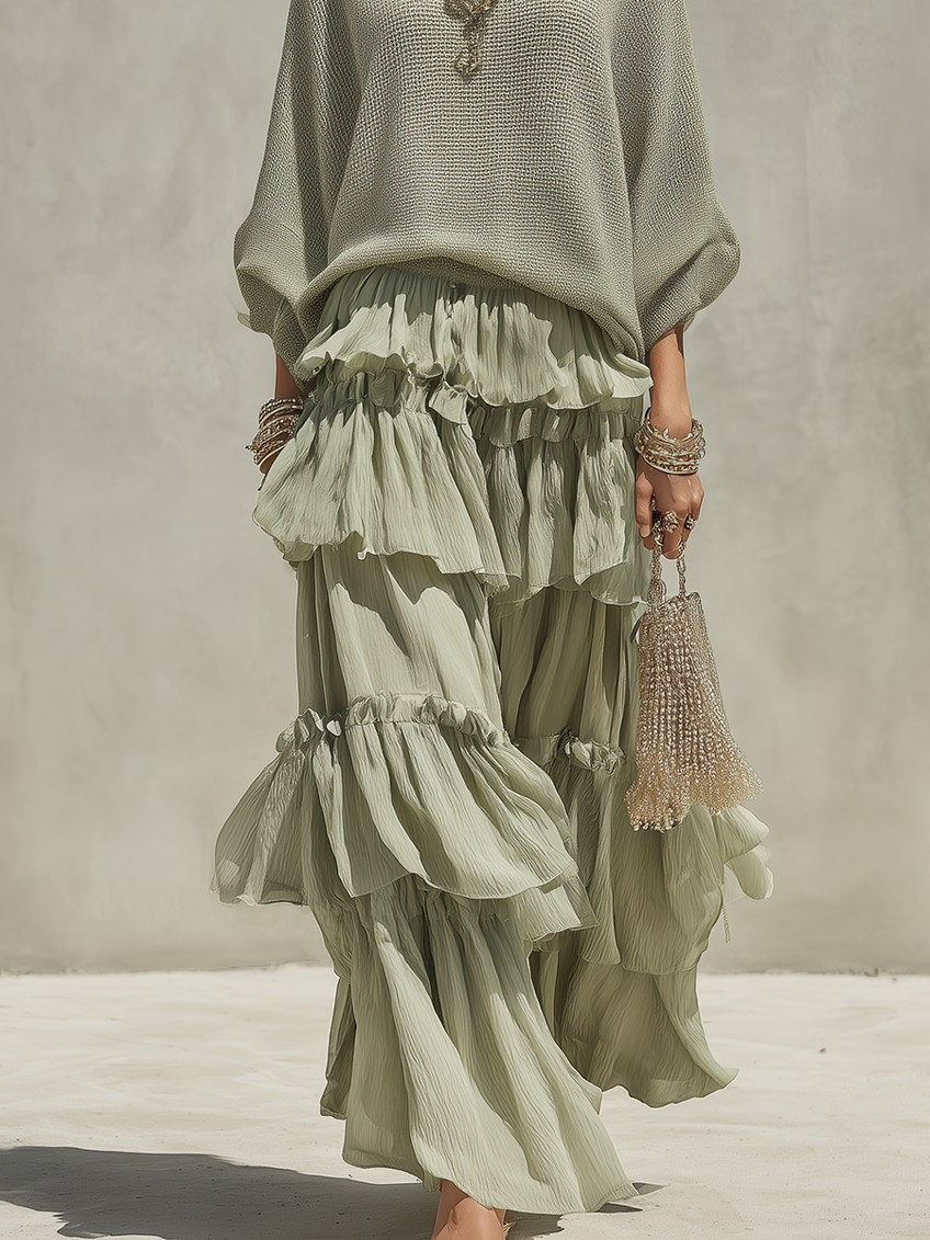 Completo boho con maglione verde salvia e gonna con volant
