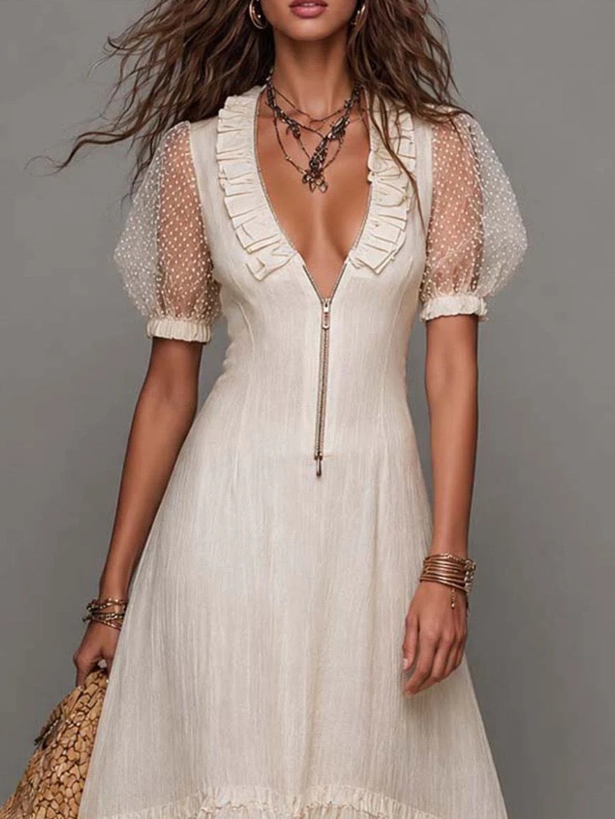Vestido midi blanco bohemio con textura, mangas abullonadas, bajo con volantes y cierre frontal
