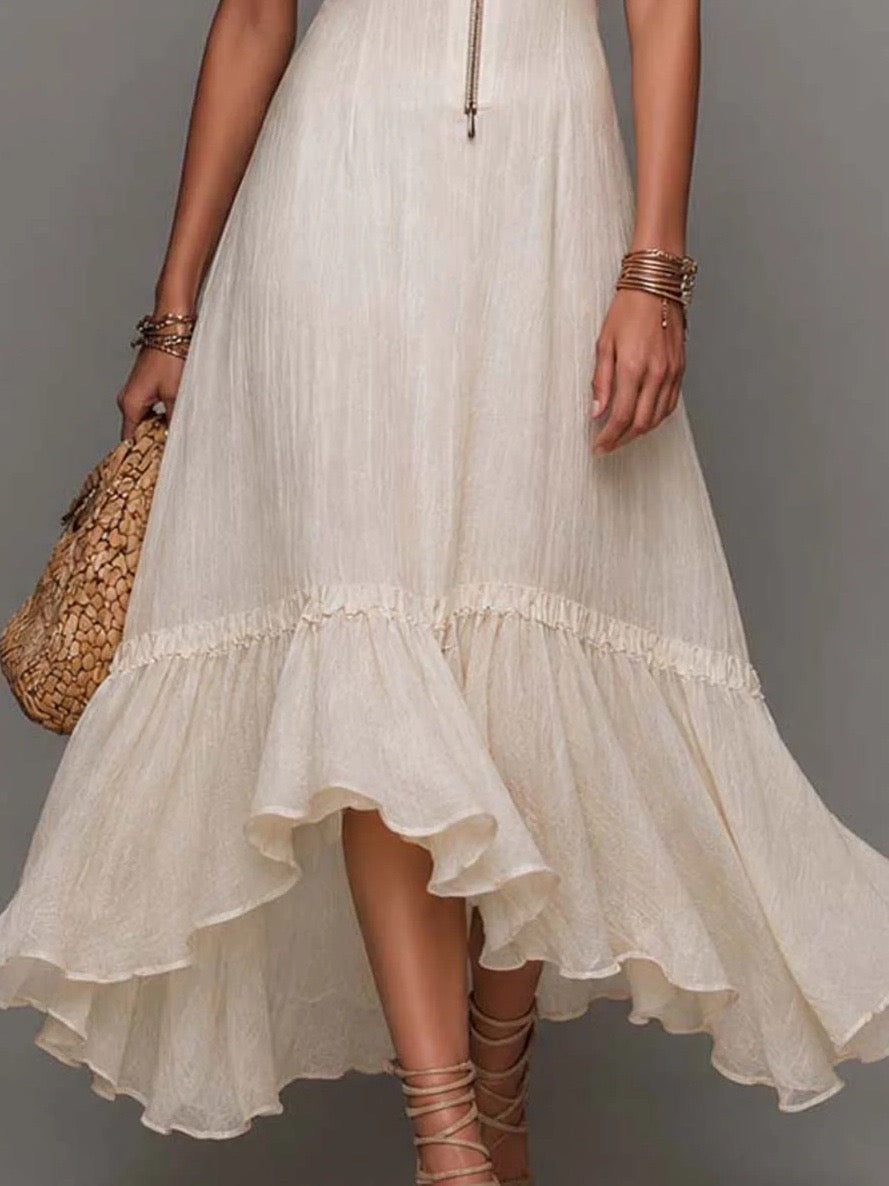 Vestido midi blanco bohemio con textura, mangas abullonadas, bajo con volantes y cierre frontal