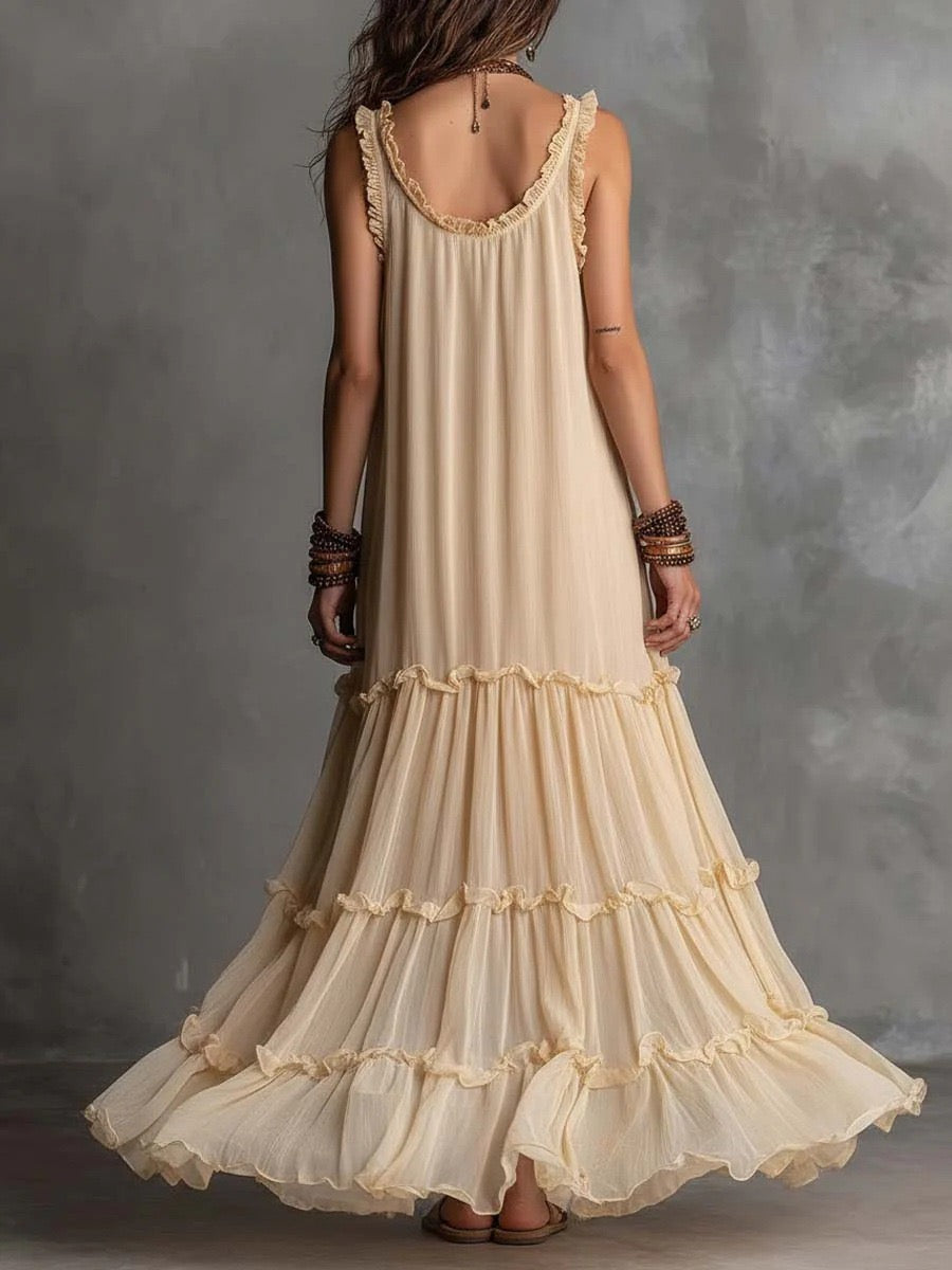 Vestido de chiffon boémio sem mangas, com decote redondo, gola com costas descobertas e folhos em camadas